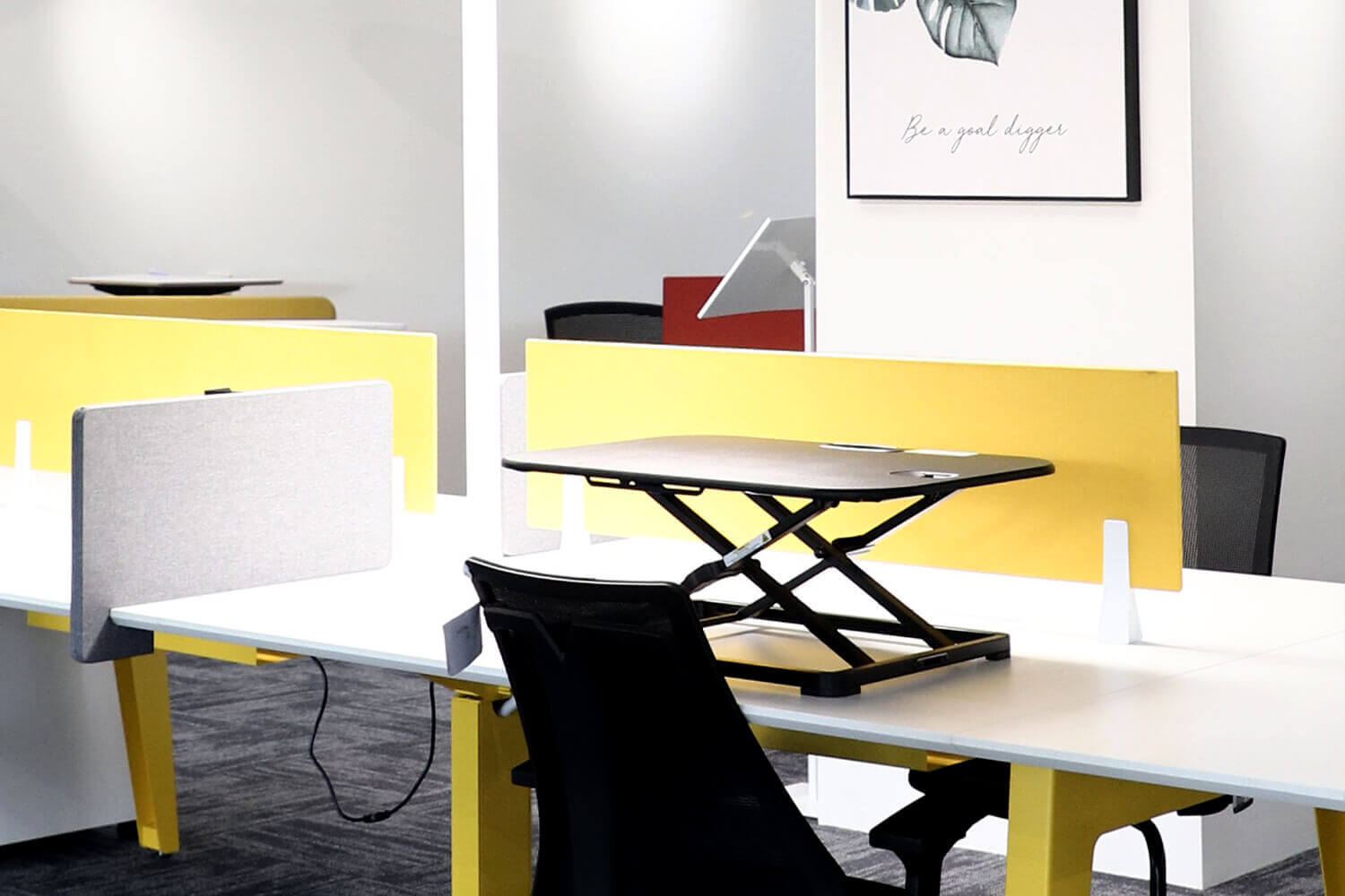 AMP desk riser on table - Comfort Furniture