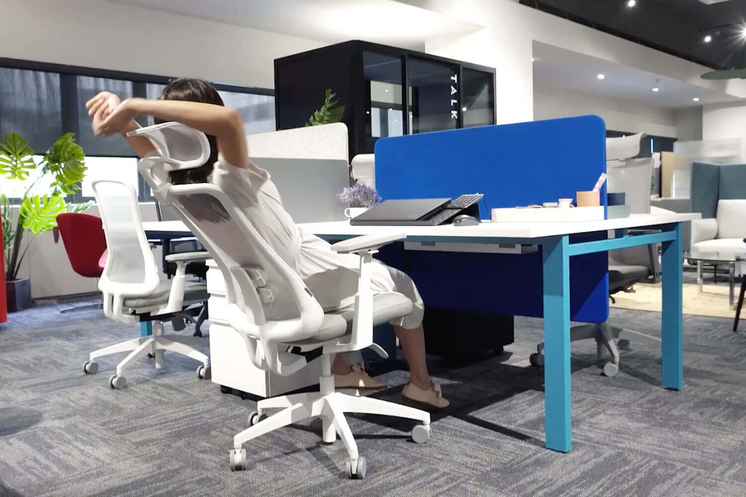 Stellar Office Chair Stretching in Office - Comfort Furniture