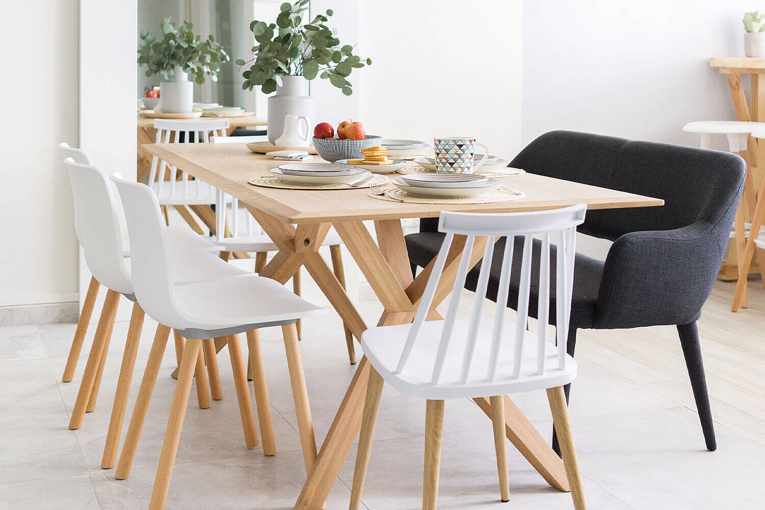 Dining Room with Mismatched Chairs in White Theme - Comfort Design Furniture.